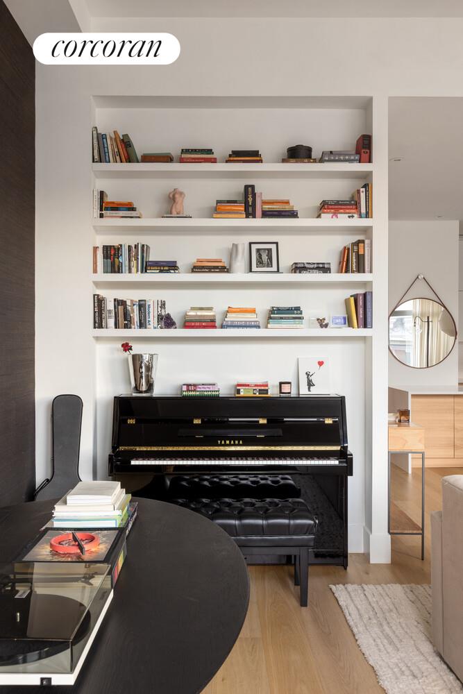72 Mercer Street, Unit 5W Manhattan, NY 10012 - Photo 10 of 17 a view of workspace with cabinets