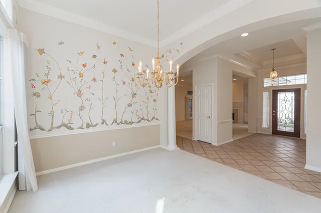 a view of a spacious bathroom with a bathtub and shower