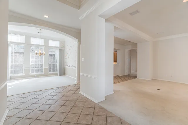 a view of an empty room and window