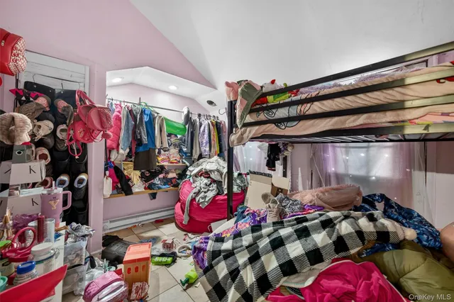 a store room with lots of different colored cloths