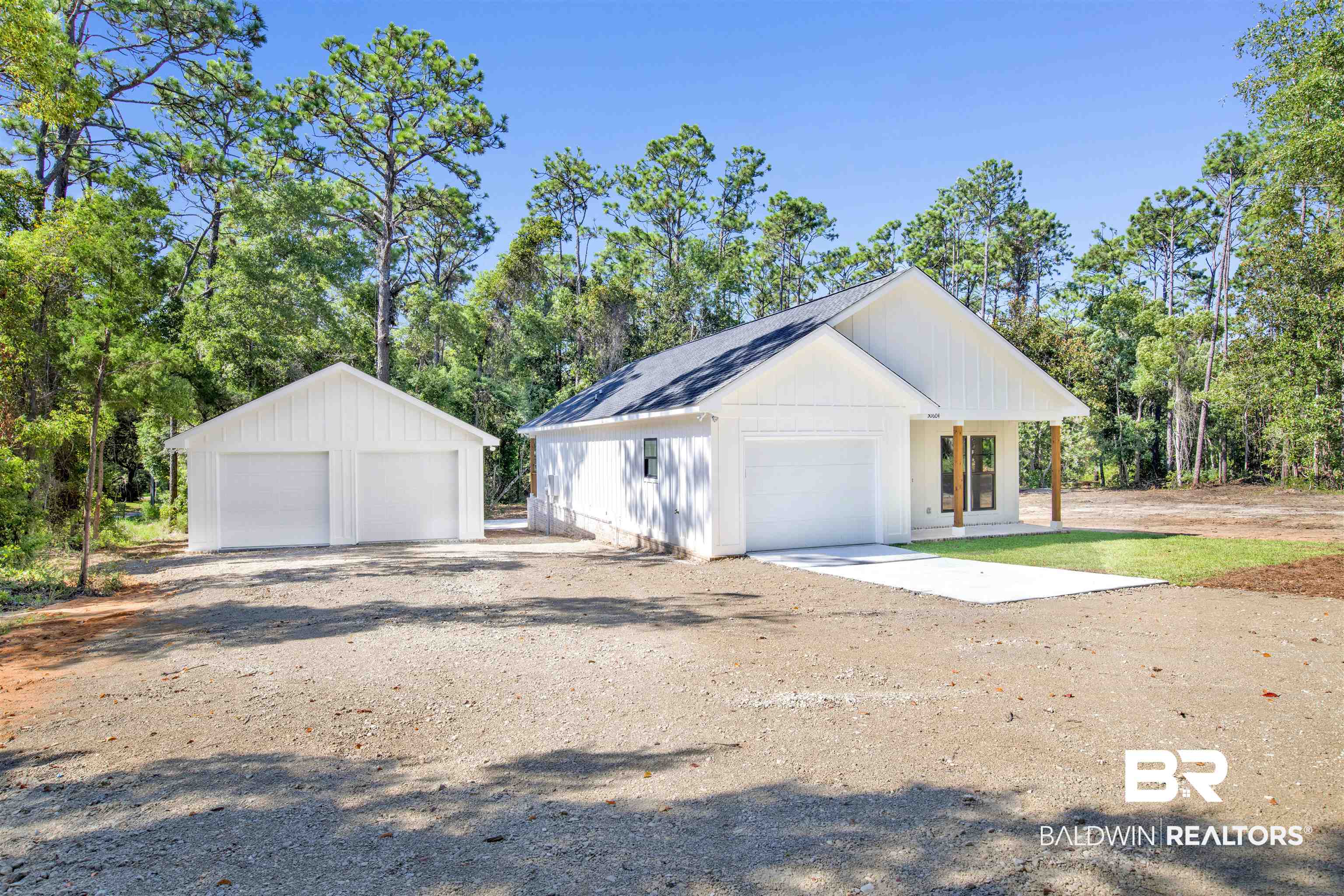 30604 Orange Street Elberta, AL 36530 - Photo 2 of 27 View of side of property with a garage and an outdoor structure
