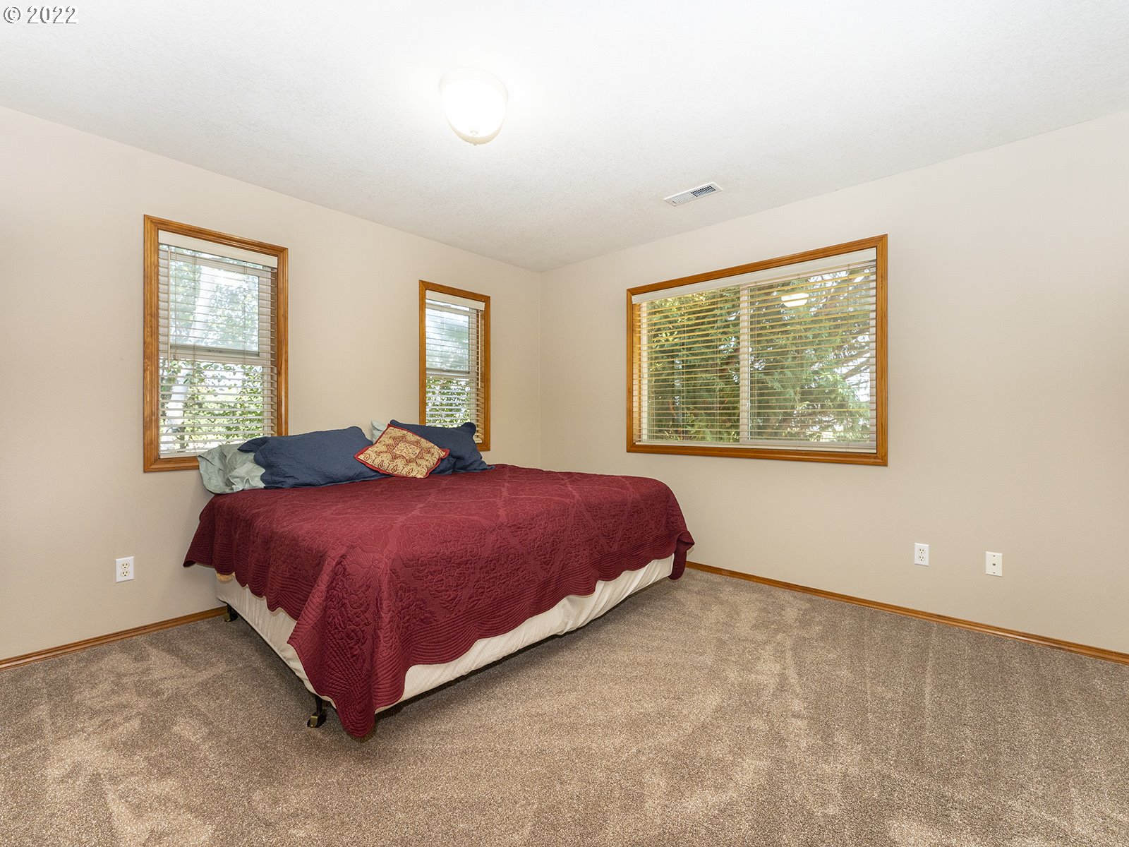 2286 South 31st Court Ridgefield, WA 98642 - Photo 19 of 31 a bedroom with a bed and window
