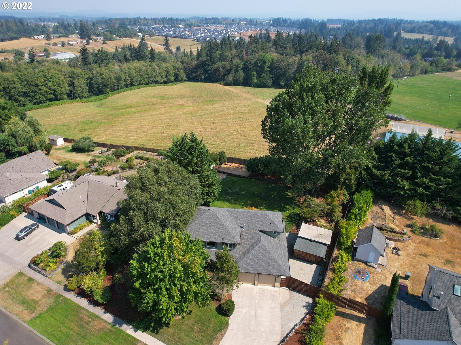 2286 South 31st Court Ridgefield, WA 98642 - Photo 28 of 31 an aerial view of a house with garden space and outdoor seating