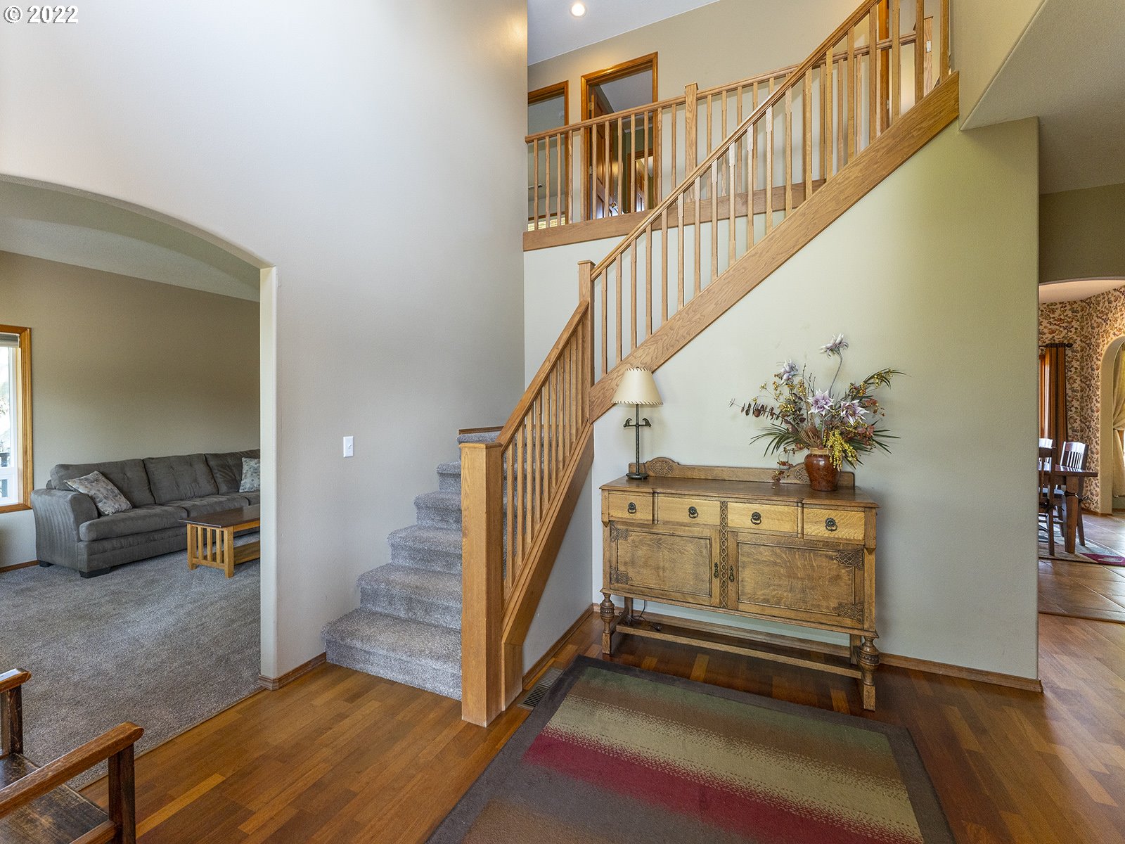 2286 South 31st Court Ridgefield, WA 98642 - Photo 4 of 31 a view of entryway and hall with wooden floor