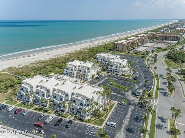 a view of a city with an ocean