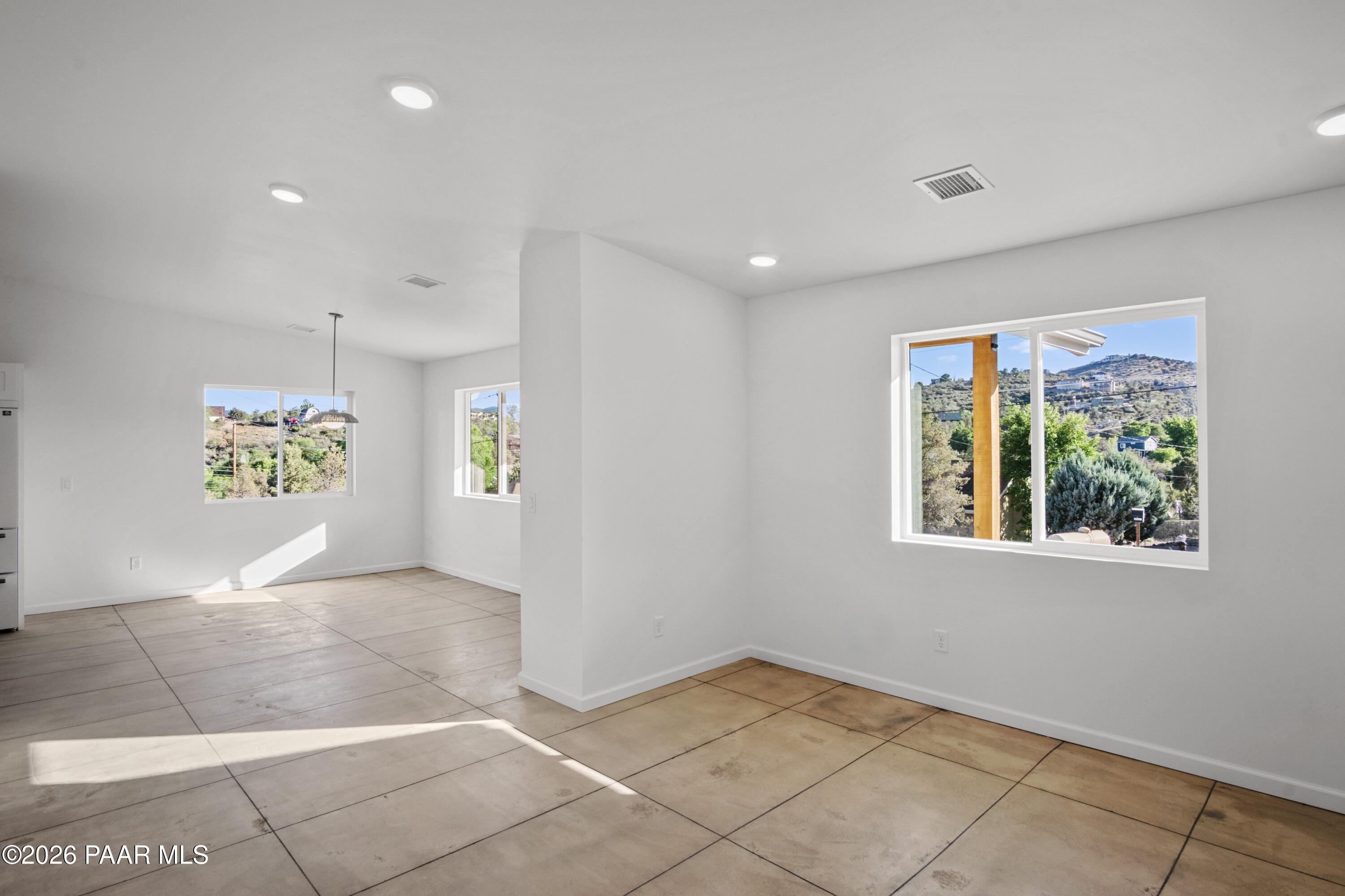 4920 East Amber Road Prescott, AZ 86301 - Photo 15 of 38 a view of an empty room with a window