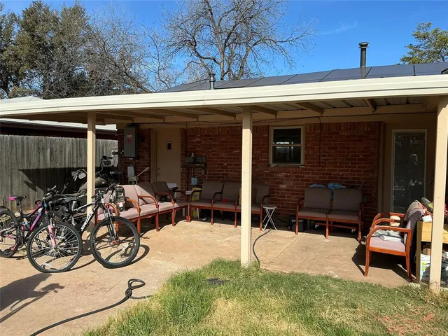 a view of a car park in front of house