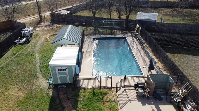 a view of a balcony with chairs