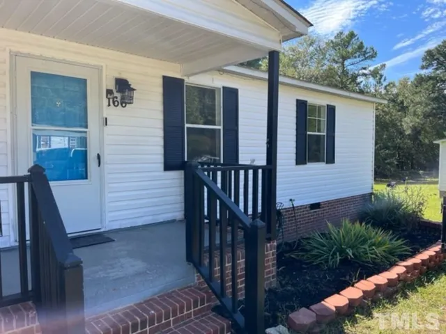 a view of front door and porch