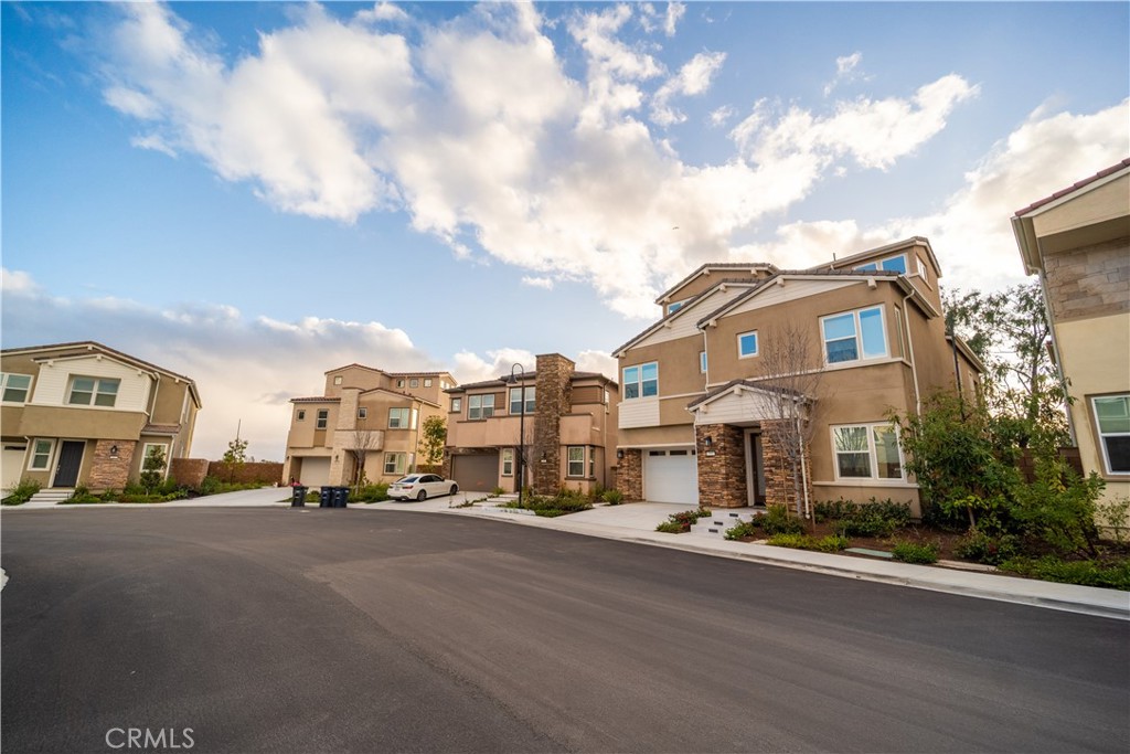 599 Serrano Summit Drive Lake Forest, CA 92630 - Photo 25 of 31 a city street lined with buildings and trees