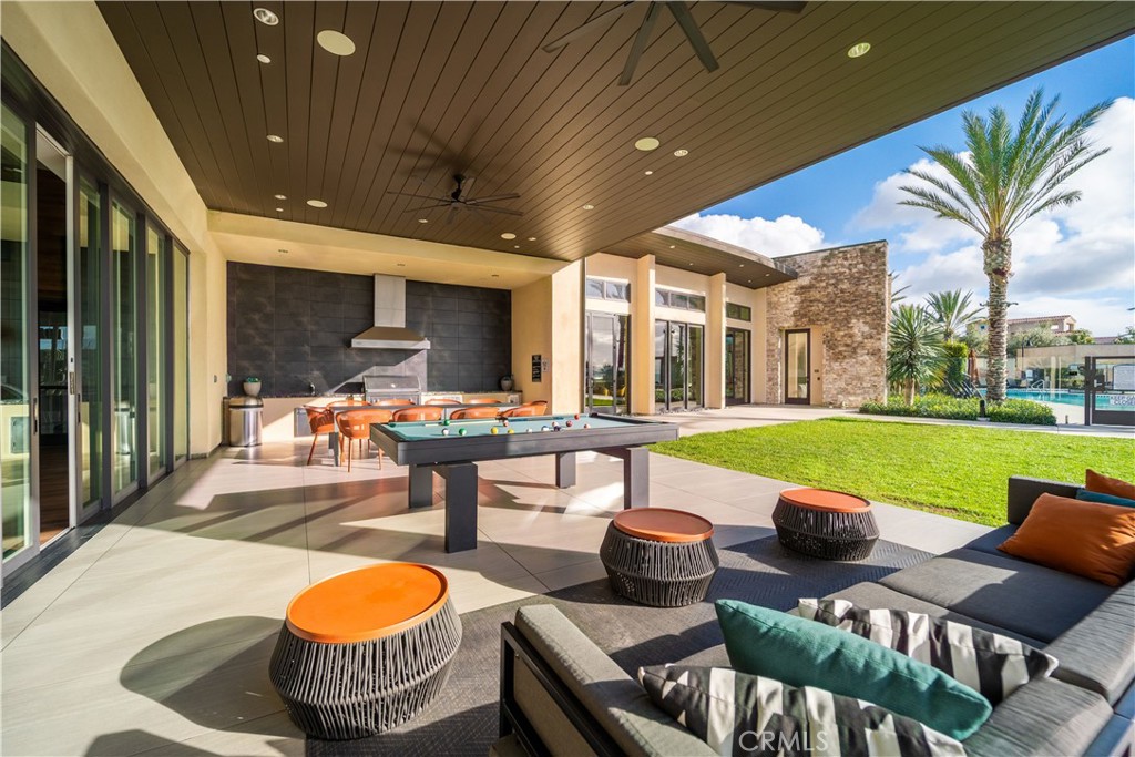 599 Serrano Summit Drive Lake Forest, CA 92630 - Photo 28 of 31 a swimming pool with outdoor seating and yard