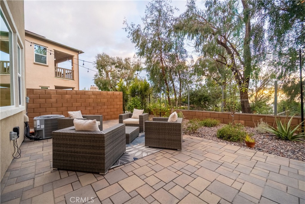 599 Serrano Summit Drive Lake Forest, CA 92630 - Photo 7 of 31 a view of patio with couches and a fire pit