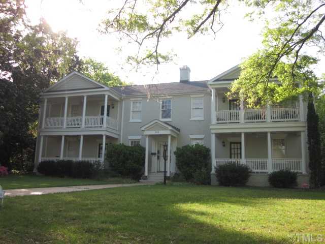 1115 Wake Forest Road, Unit A Raleigh, NC 27604 - Photo 2 of 25 a front view of a house with a garden and porch