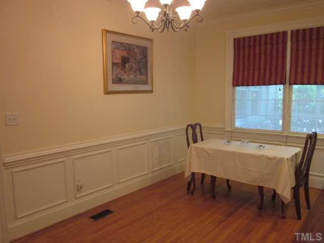 1115 Wake Forest Road, Unit A Raleigh, NC 27604 - Photo 25 of 25 a view of a workspace with furniture and window