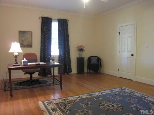 1115 Wake Forest Road, Unit A Raleigh, NC 27604 - Photo 21 of 25 a workspace with furniture and window