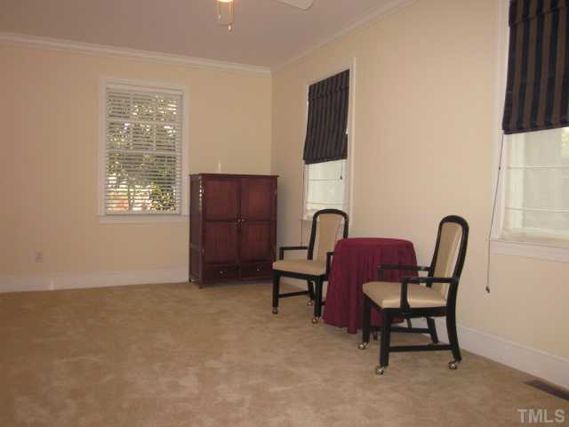 1115 Wake Forest Road, Unit A Raleigh, NC 27604 - Photo 23 of 25 a living room with furniture and a window
