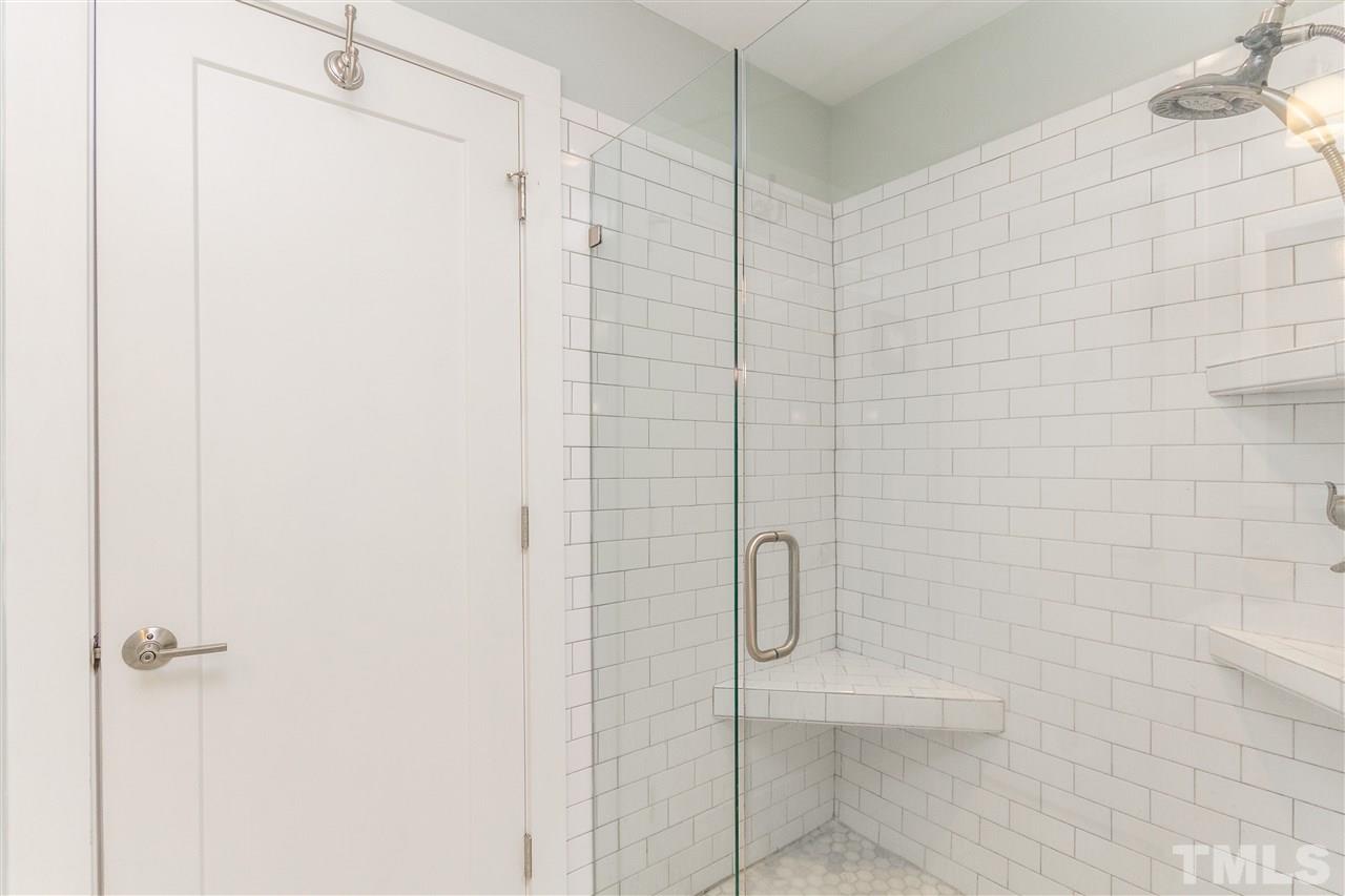 812 Postell Street Raleigh, NC 27601 - Photo 14 of 24 a bathroom with a shower