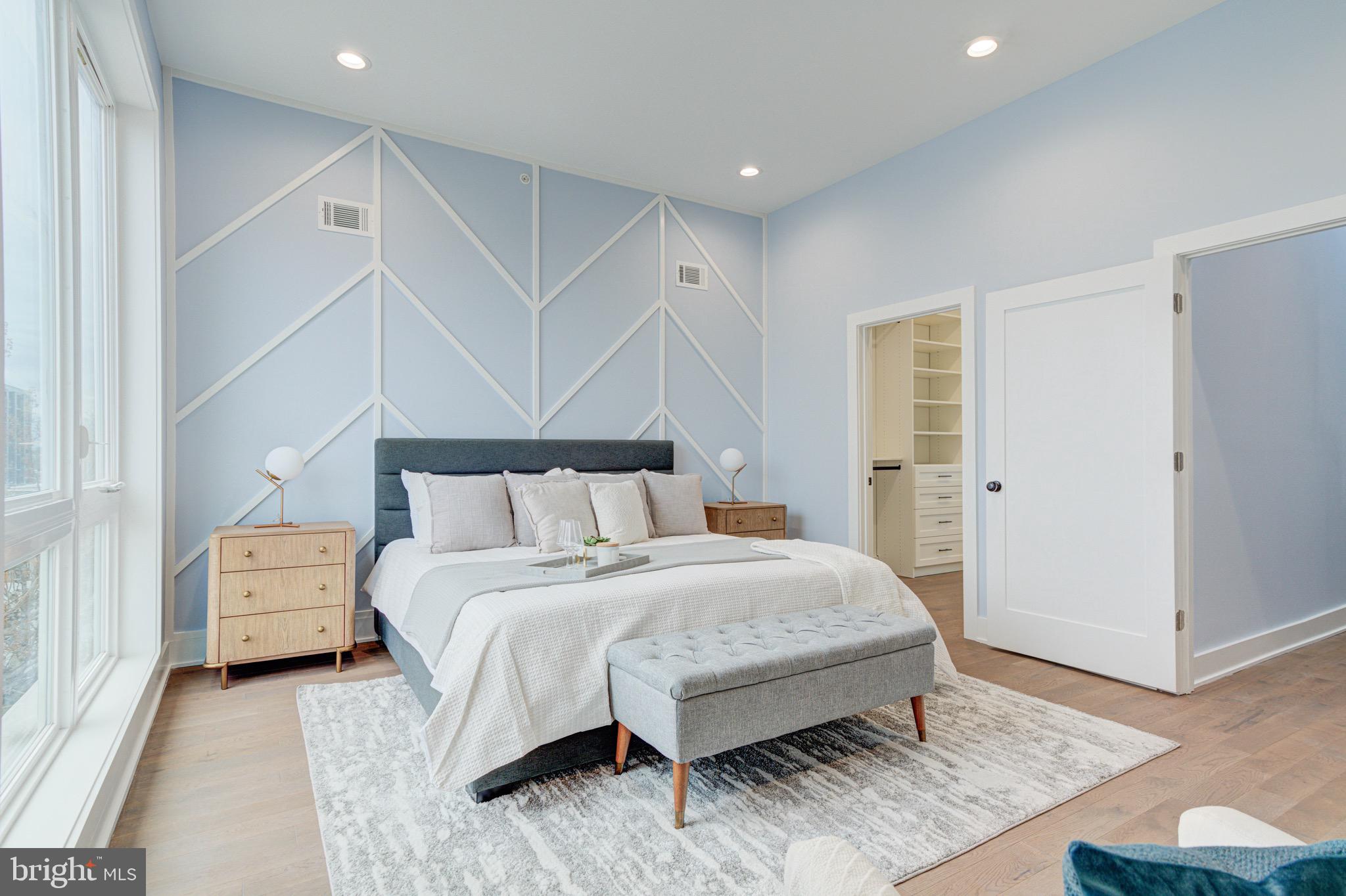 2318 East Hazzard Street Philadelphia, PA 19125 - Photo 15 of 44 a bedroom with a bed and a night stand