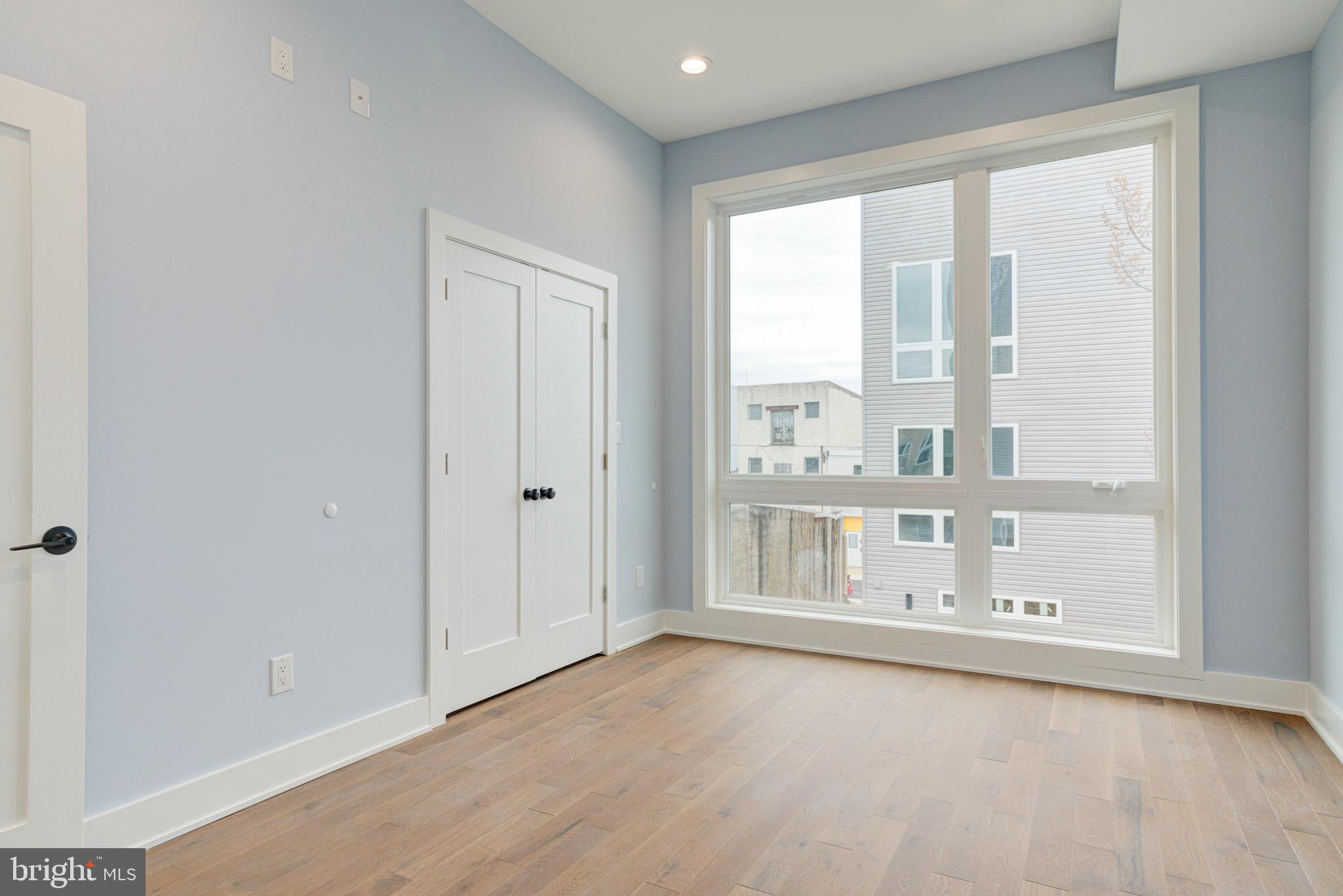 2318 East Hazzard Street Philadelphia, PA 19125 - Photo 20 of 44 an empty room with window