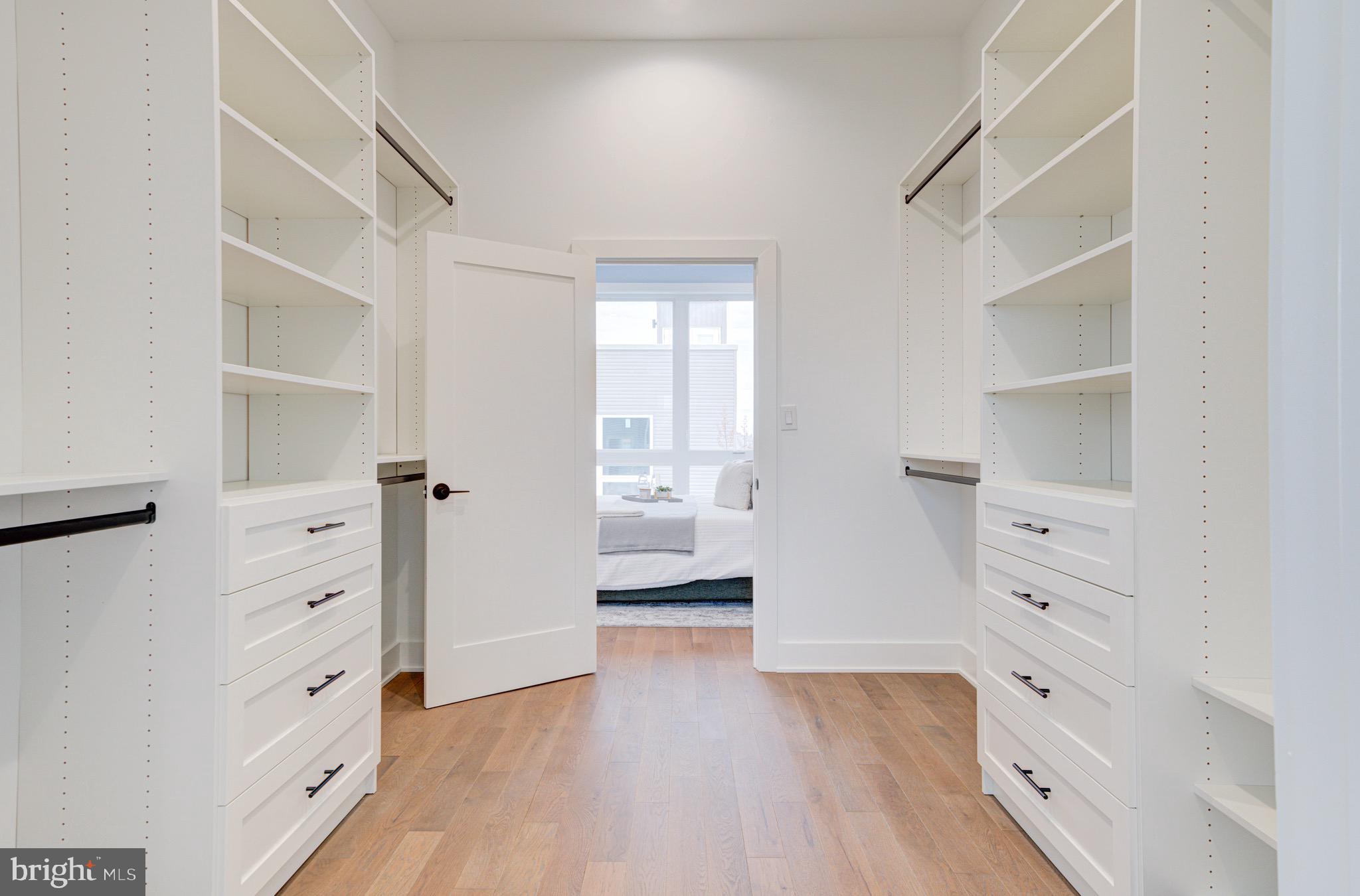 2318 East Hazzard Street Philadelphia, PA 19125 - Photo 27 of 44 wooden floor with white cabinets and wooden floor