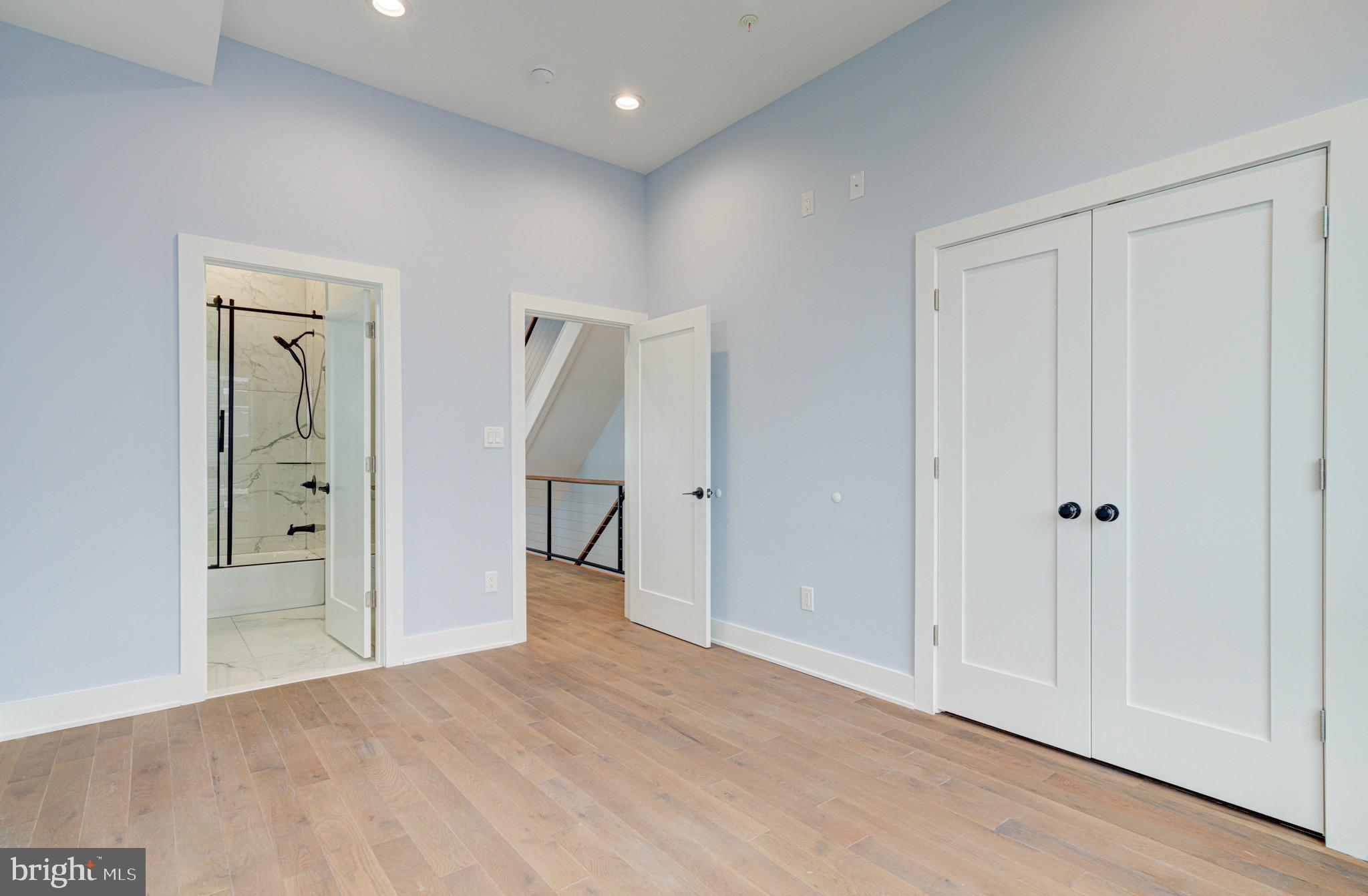 2318 East Hazzard Street Philadelphia, PA 19125 - Photo 28 of 44 a view of a hallway with wooden floor