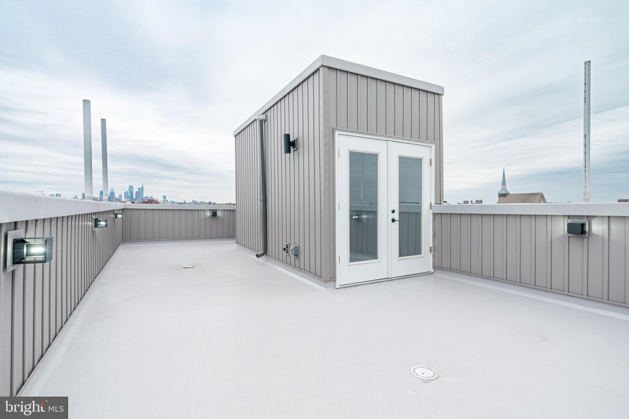 2318 East Hazzard Street Philadelphia, PA 19125 - Photo 39 of 44 a view of a kitchen with a sink and cabinets