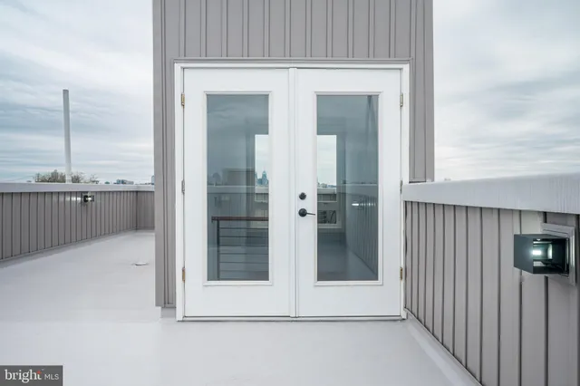 a view of a city skyline from a balcony