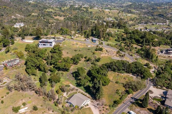 an aerial view of residential house with parking space