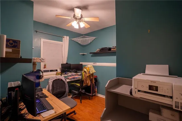 a view of a workspace with furniture