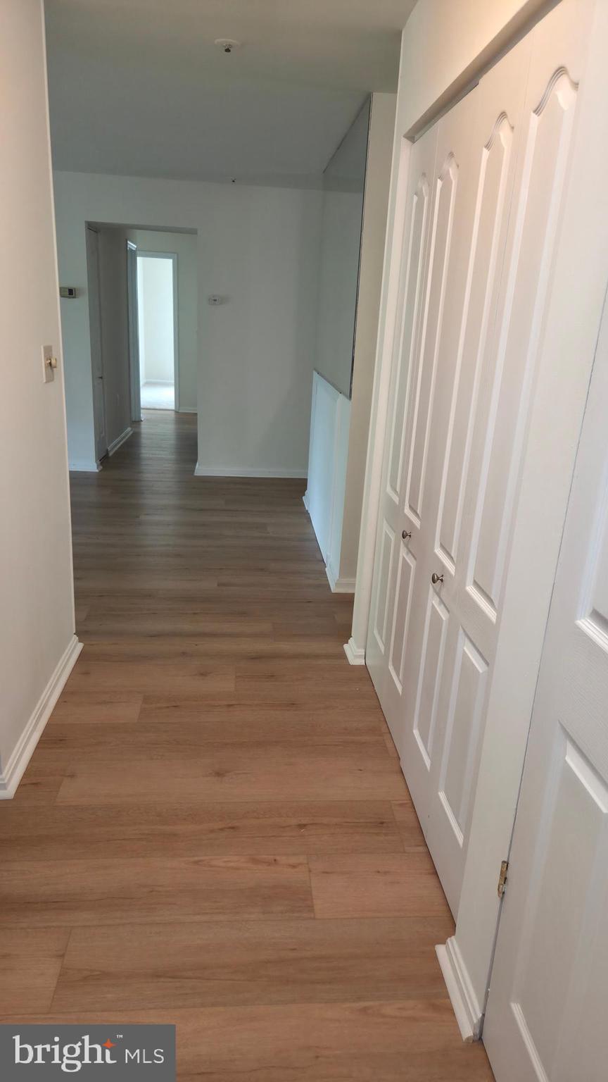 8387 Montgomery Run Road, Unit E Ellicott City, MD 21043 - Photo 9 of 25 main hallway