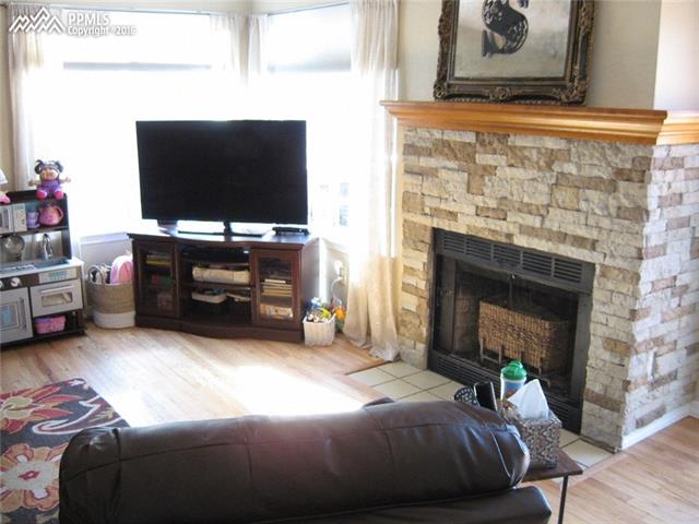 2050 Wickes Road Colorado Springs, CO 80919 - Photo 11 of 30 Stone Fireplace