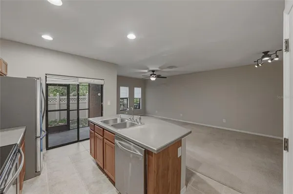 a kitchen with a stove and a sink