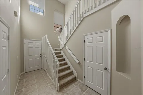a view of entryway with wooden floor
