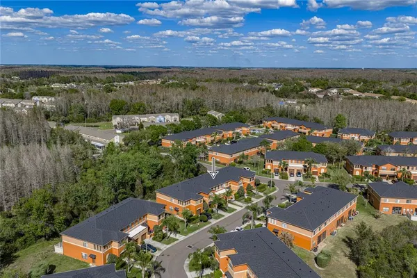 an aerial view of residential house and outdoor space