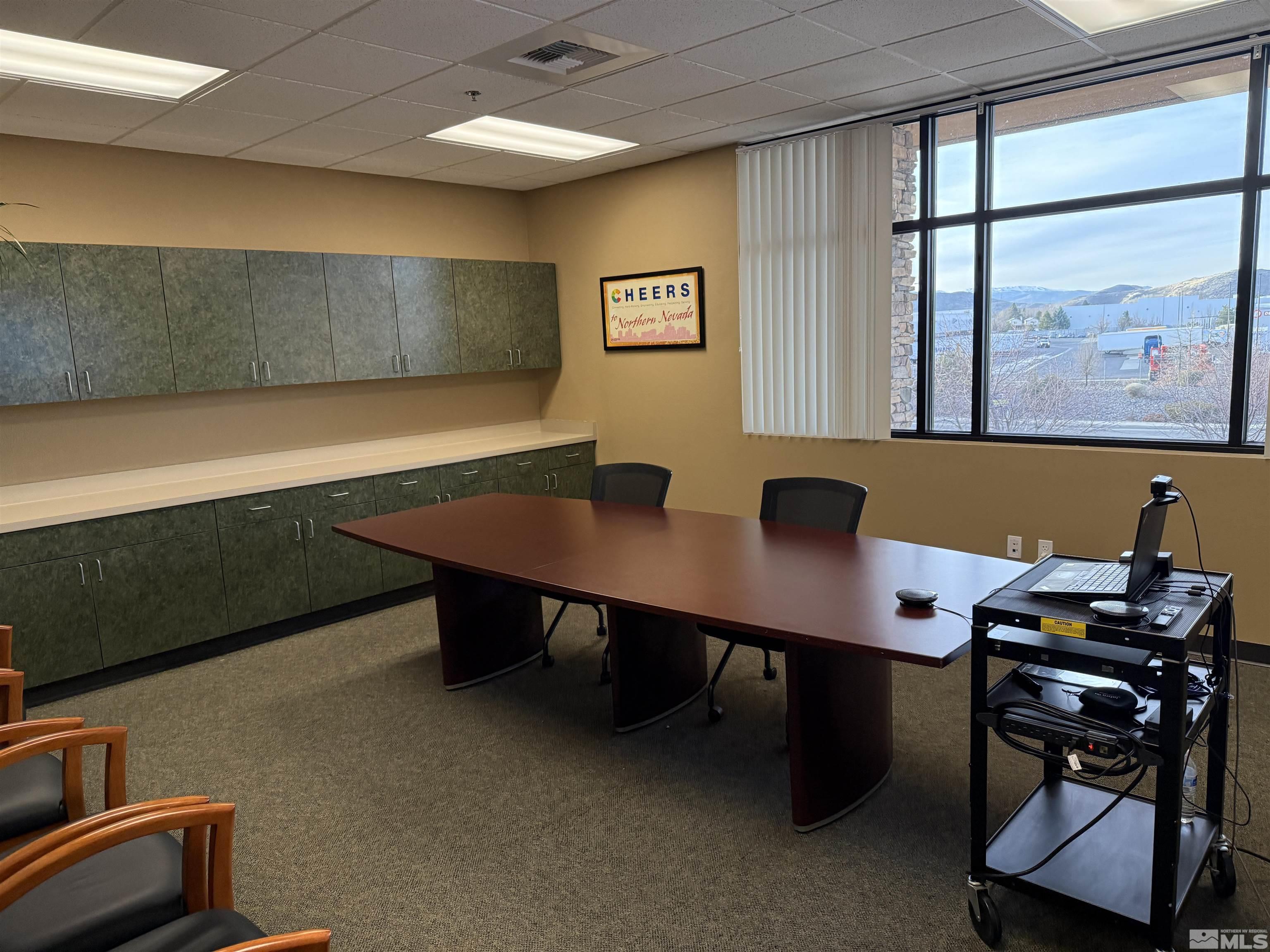 1170 South Rock Boulevard, Unit C Reno, NV 89502 - Photo 4 of 7 a view of a workspace with furniture