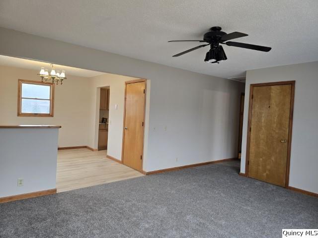 219 South 1st Street Carthage, IL 62321 - Photo 3 of 28 a view of a livingroom with a ceiling fan and window