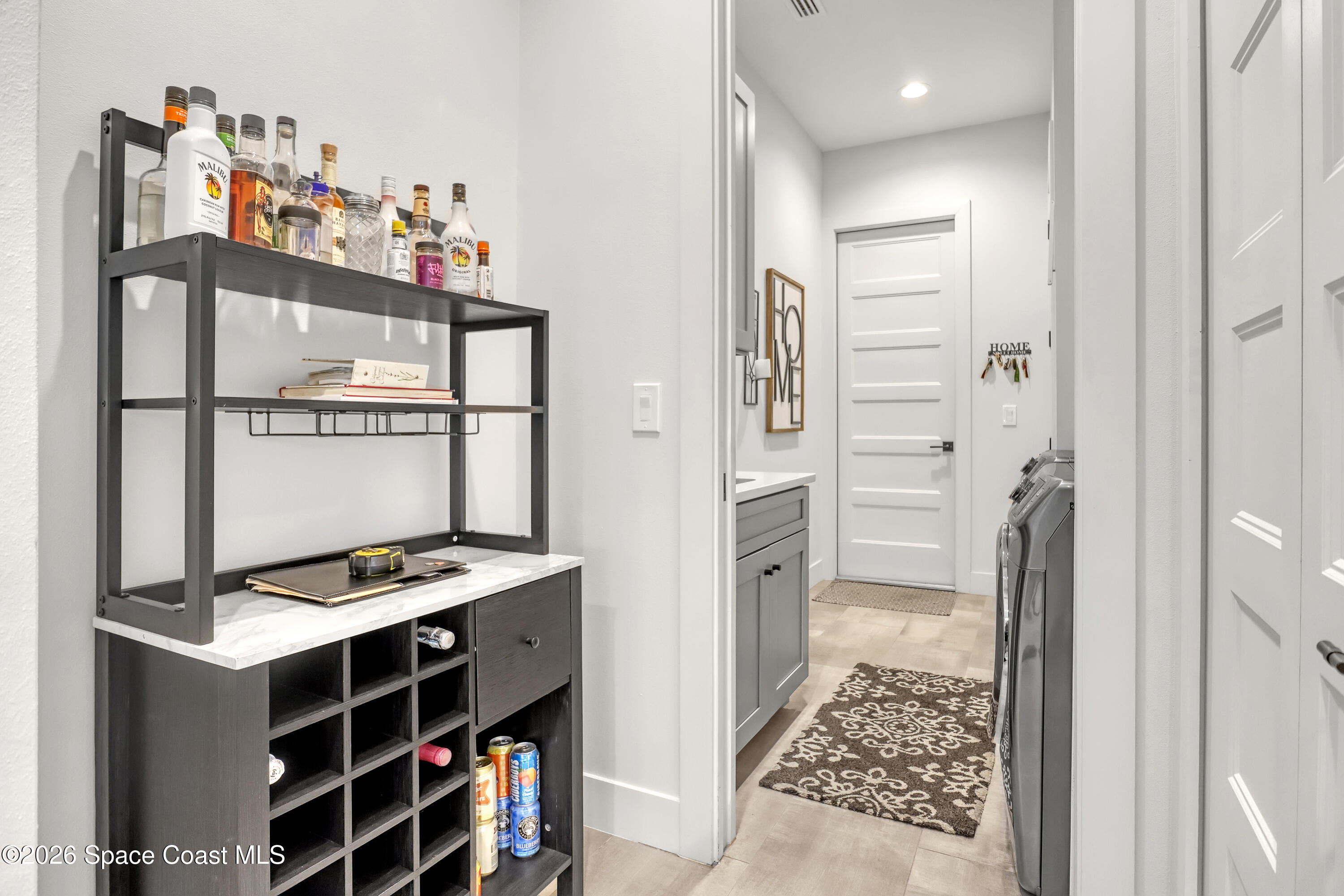 2188 Country Club Road Melbourne, FL 32901 - Photo 25 of 51 a room with furniture a rug and a window