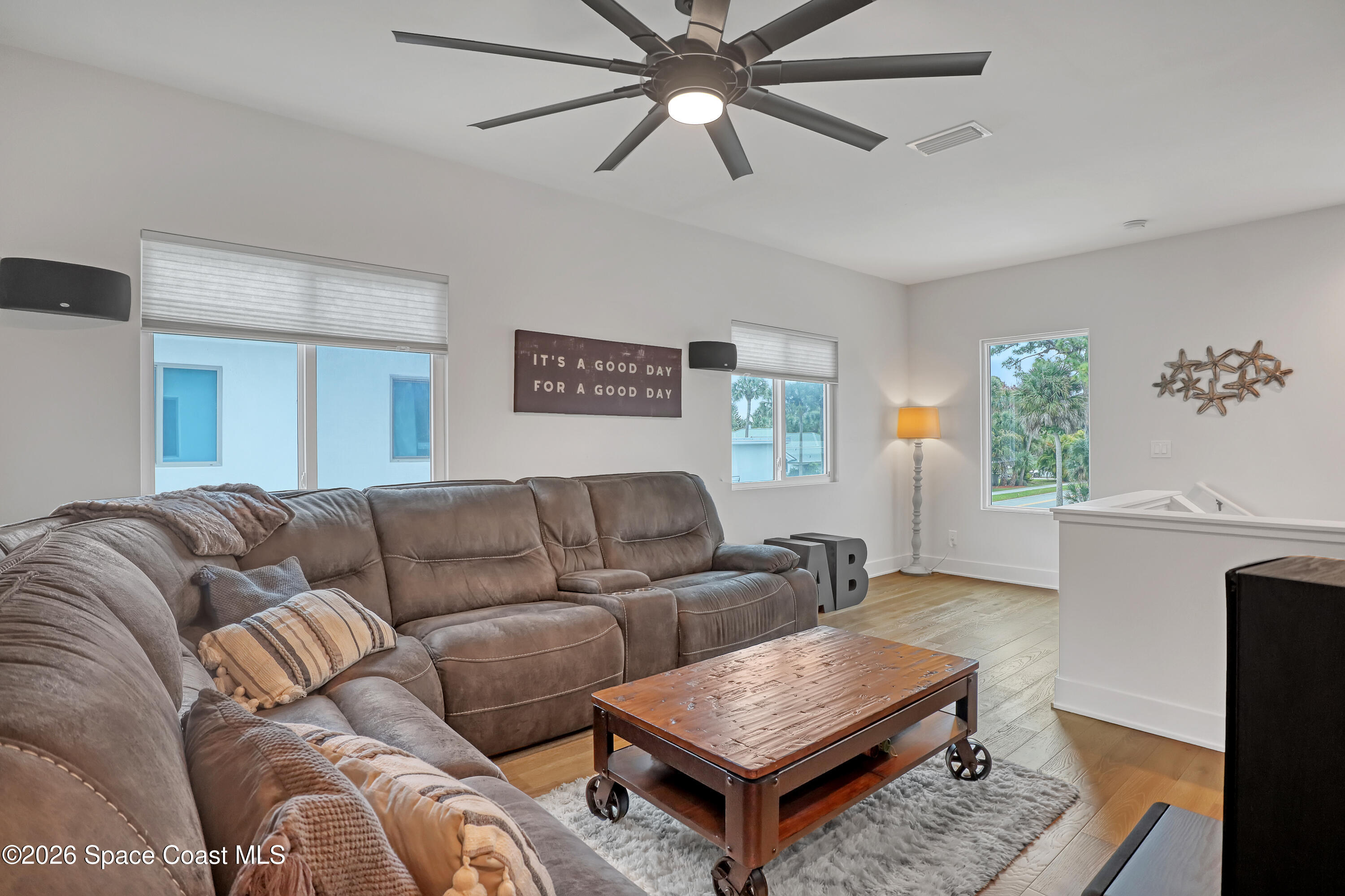 2188 Country Club Road Melbourne, FL 32901 - Photo 30 of 51 a living room with furniture and a rug