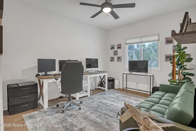 a swimming pool with an outdoor seating