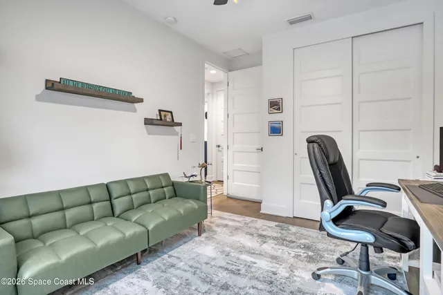 a view of a swimming pool with a porch