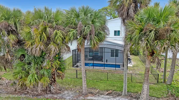 a view of a backyard with a garden