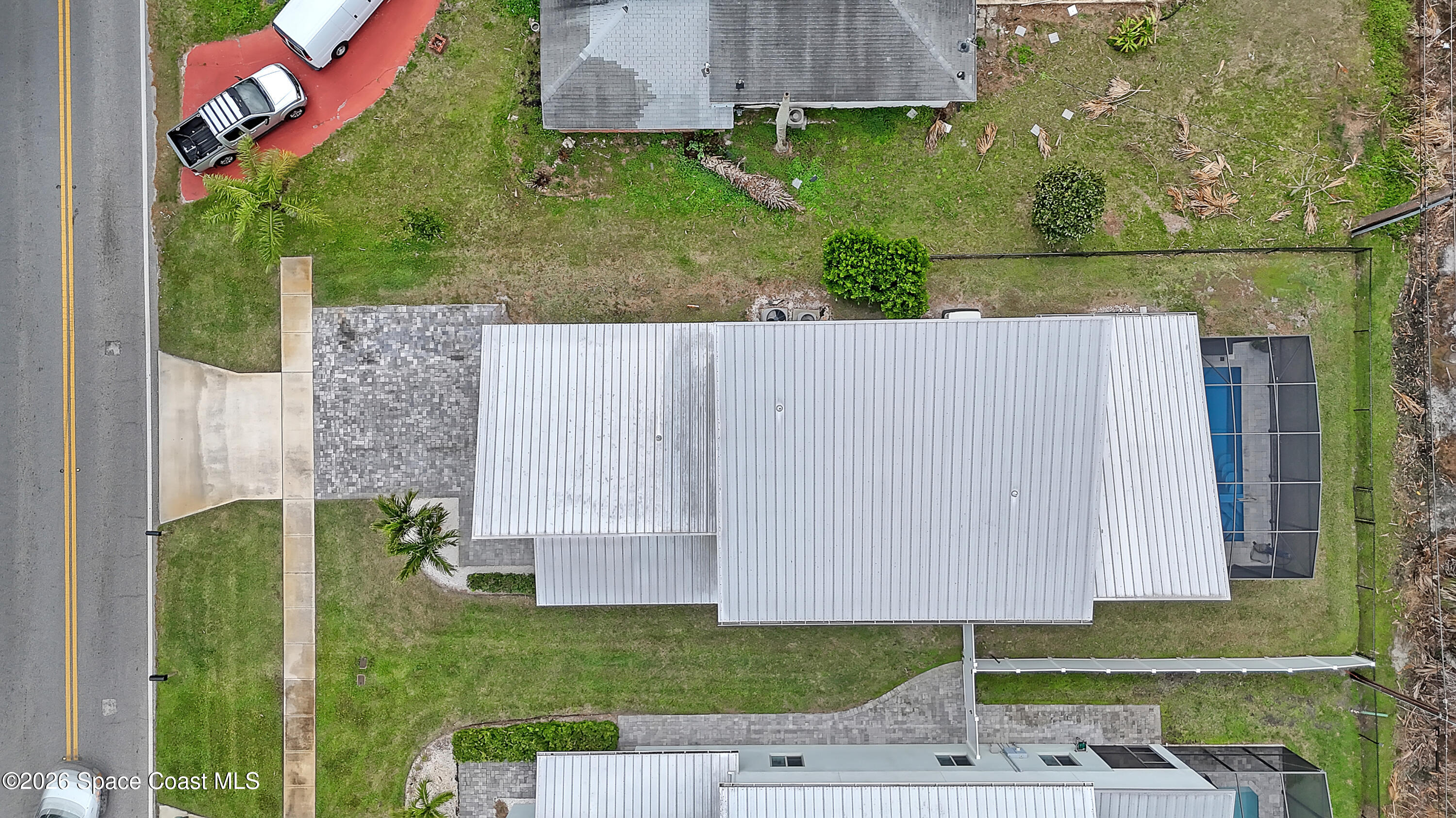 2188 Country Club Road Melbourne, FL 32901 - Photo 57 of 57 a view of a backyard with a garden