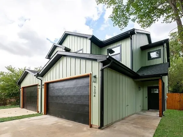 a view of front of house with garage
