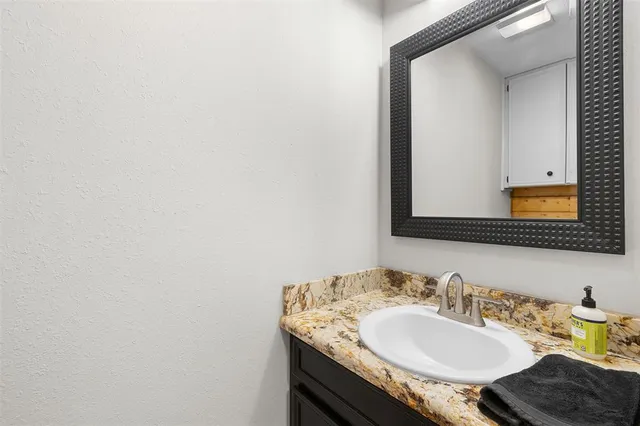 a view of a kitchen and dining room