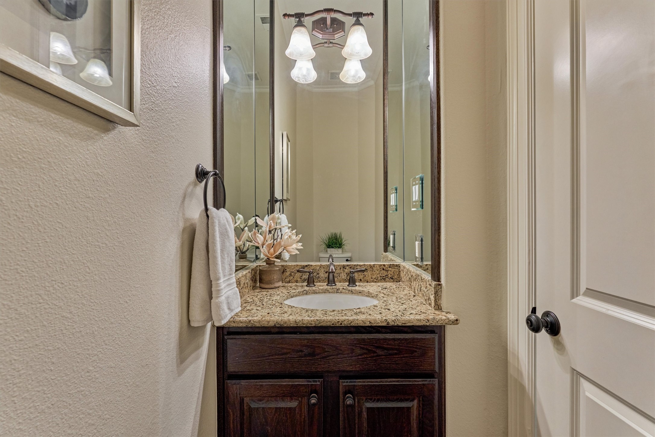 67 South Sage Sparrow Circle Spring, TX 77389 - Photo 25 of 49 a bathroom with a granite countertop sink and a mirror