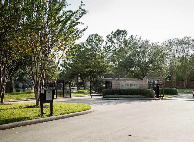 a view of a playground with basketball court
