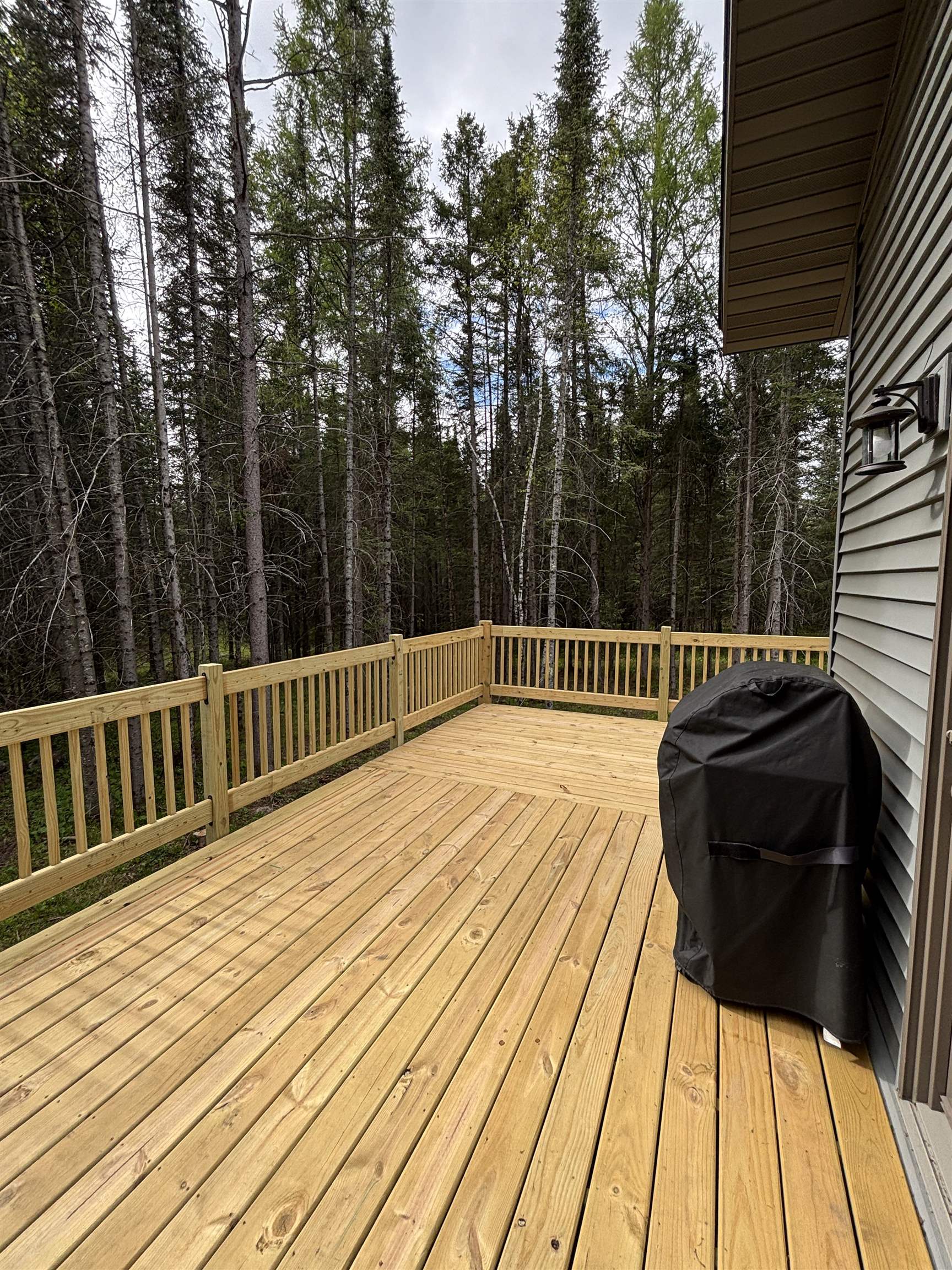 7238 Morris Thomas Road Cloquet, MN 55720 - Photo 23 of 27 Wooden deck featuring area for grilling