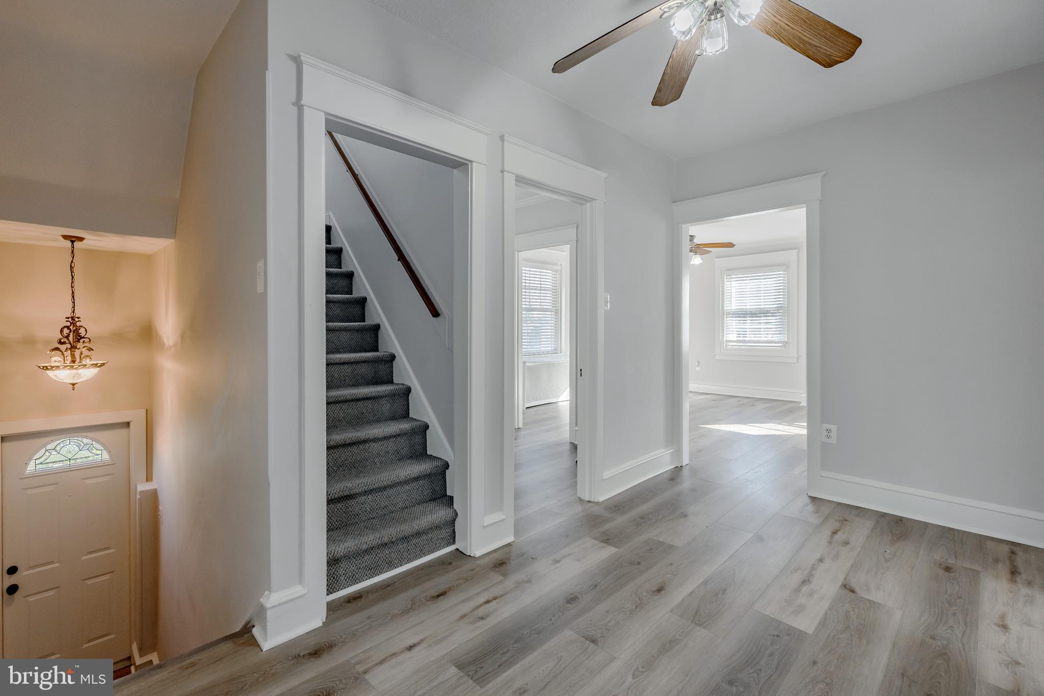 1210 West Darby Road Havertown, PA 19083 - Photo 8 of 33 a view of a hallway with wooden floor and staircase