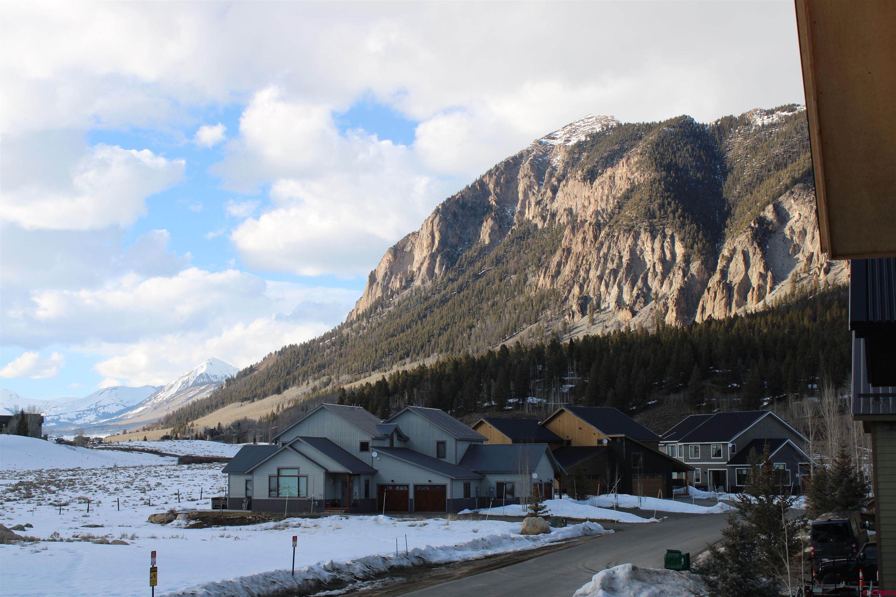 101 Elk Valley Road, Unit C Crested Butte, CO 81224 - Photo 40 of 41 a view of a house with a yard