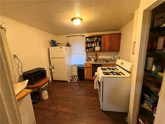 a bedroom with a bed and a walk in closet